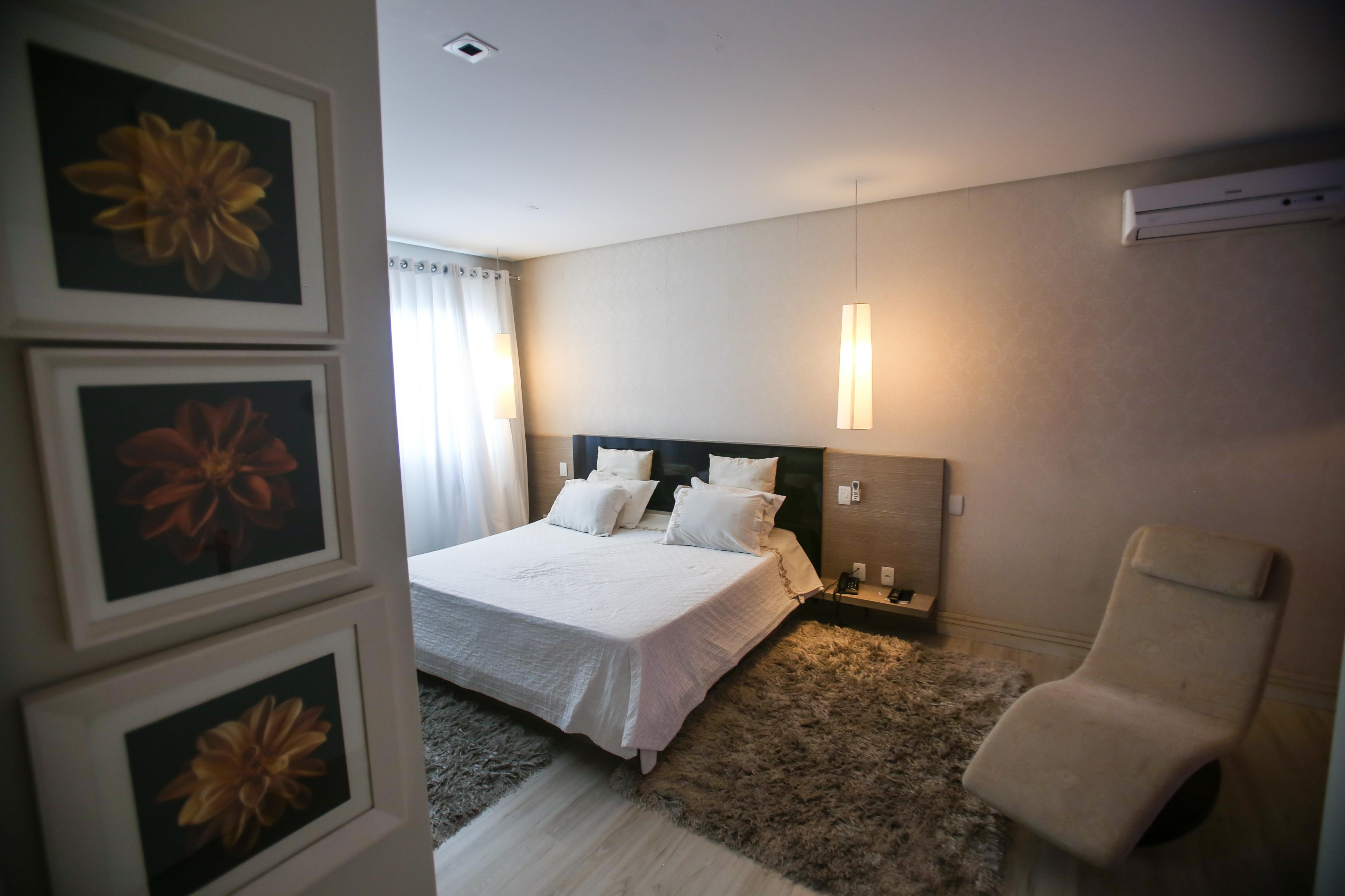 Gontijo Inn Hotel Itajubá Εξωτερικό φωτογραφία A bedroom in a house